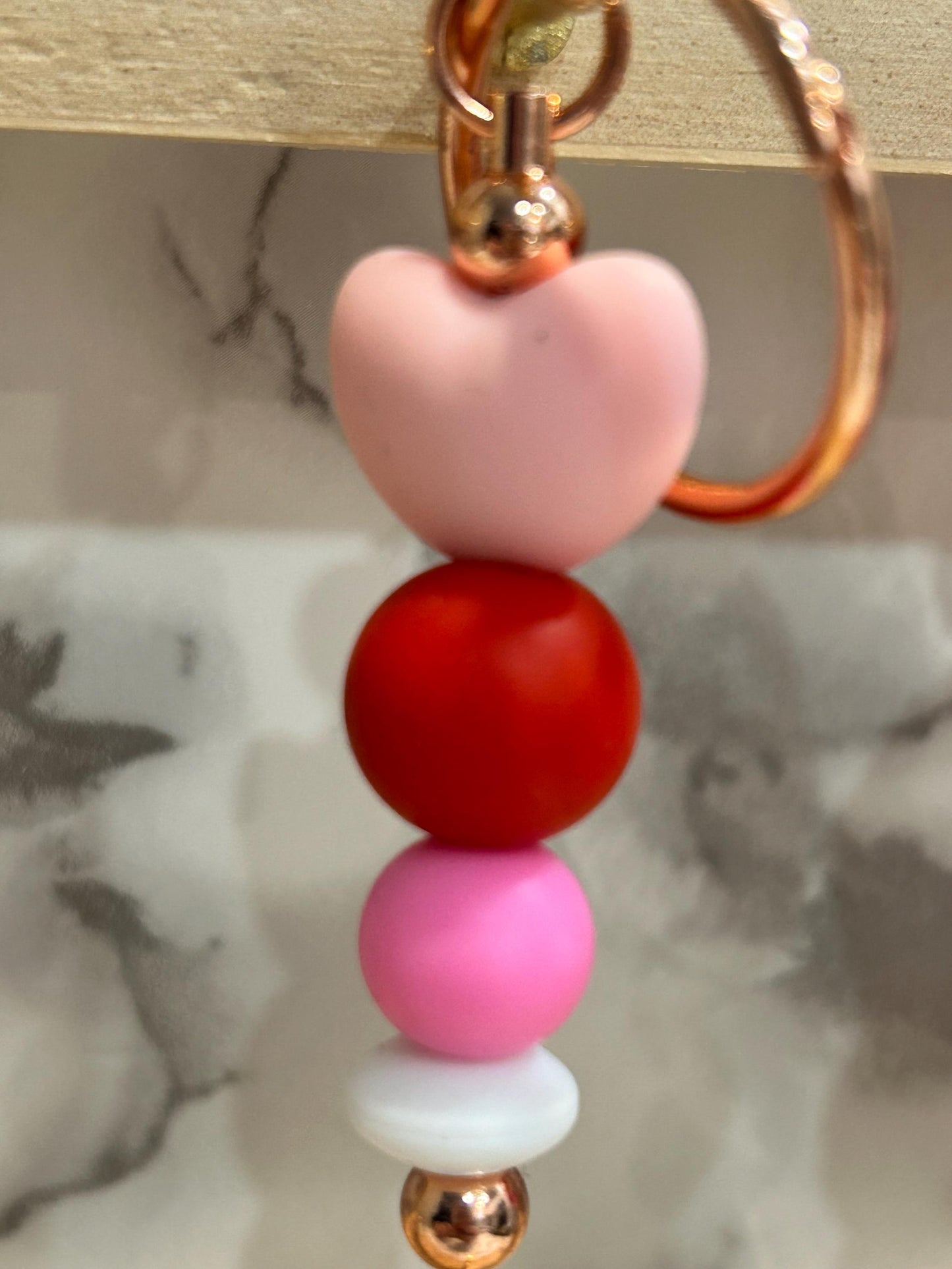 Heart themed keychains. silicone beaded keychains.