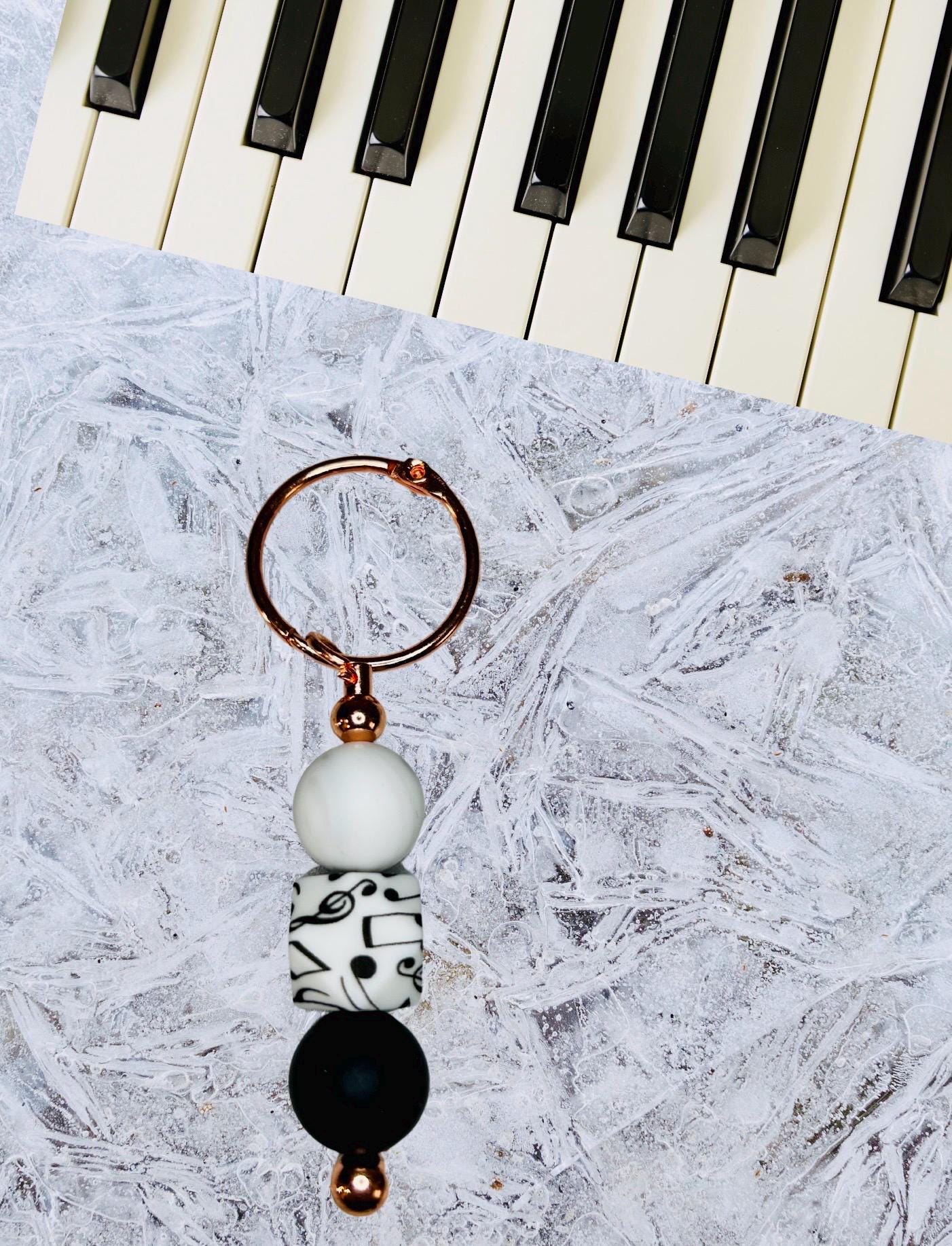 Music note silicone beaded keychains.  music notes. keychains. piano. music lovers. gift