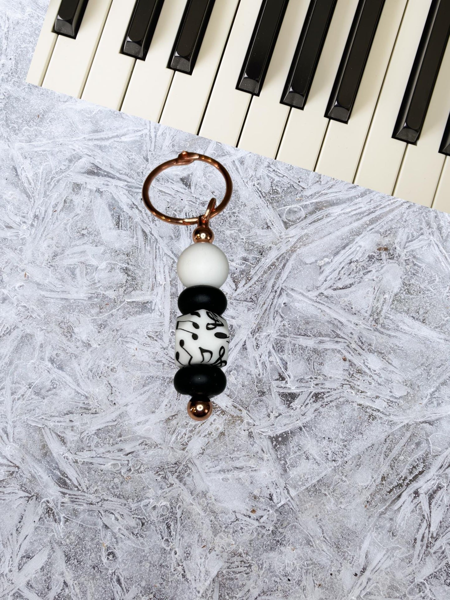 Music note silicone beaded keychains.  music notes. keychains. piano. music lovers. gift