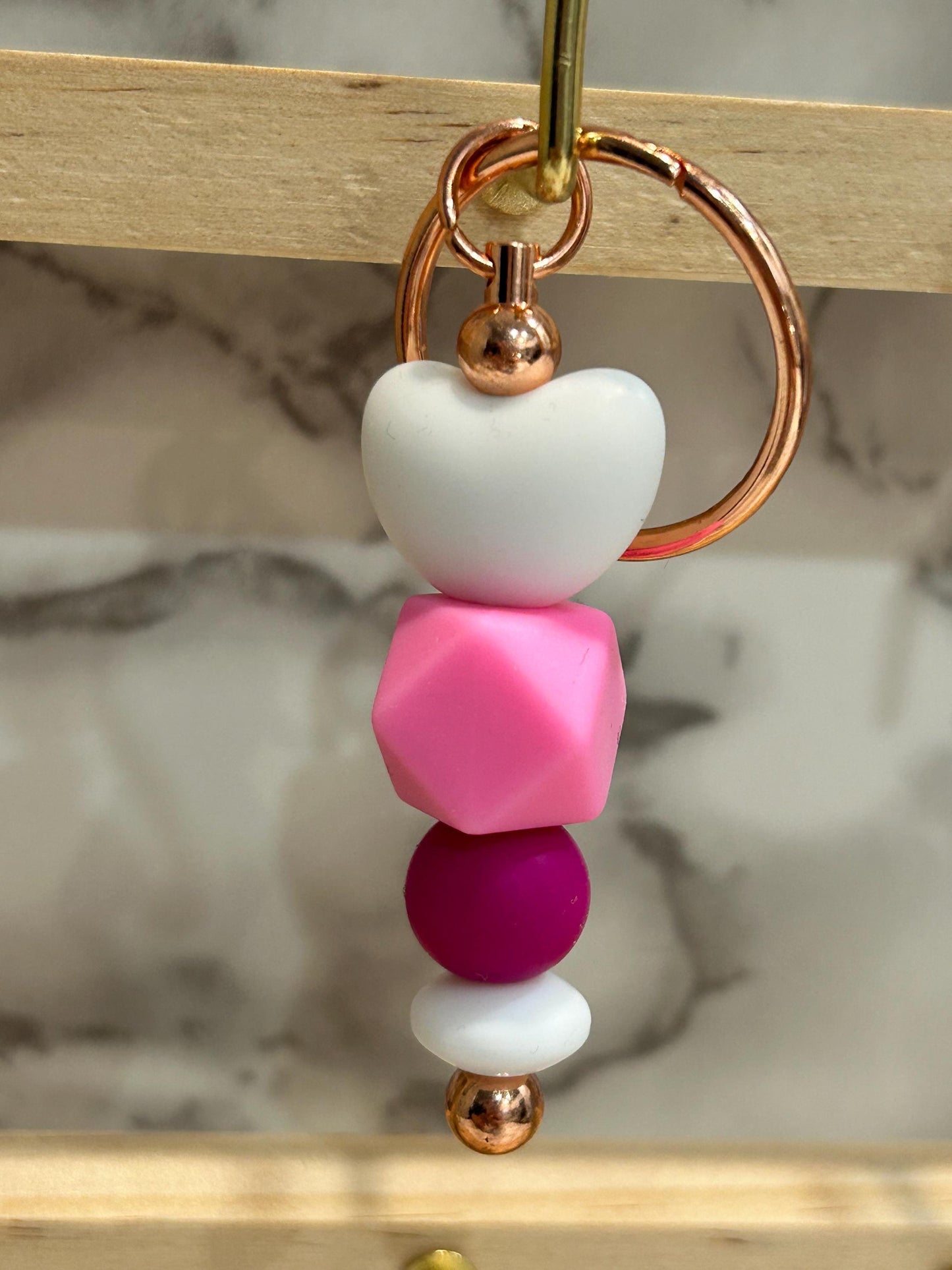 Heart themed keychains. silicone beaded keychains.